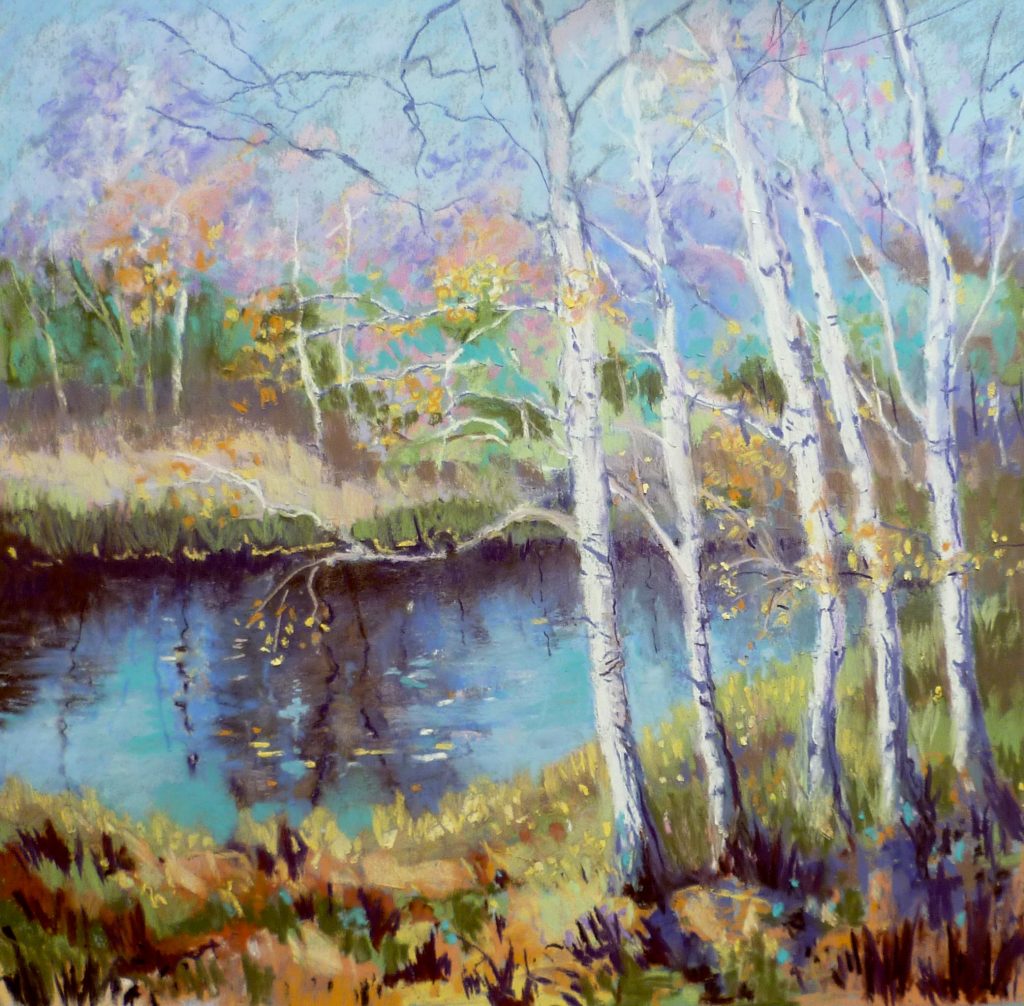 Birch trees by water